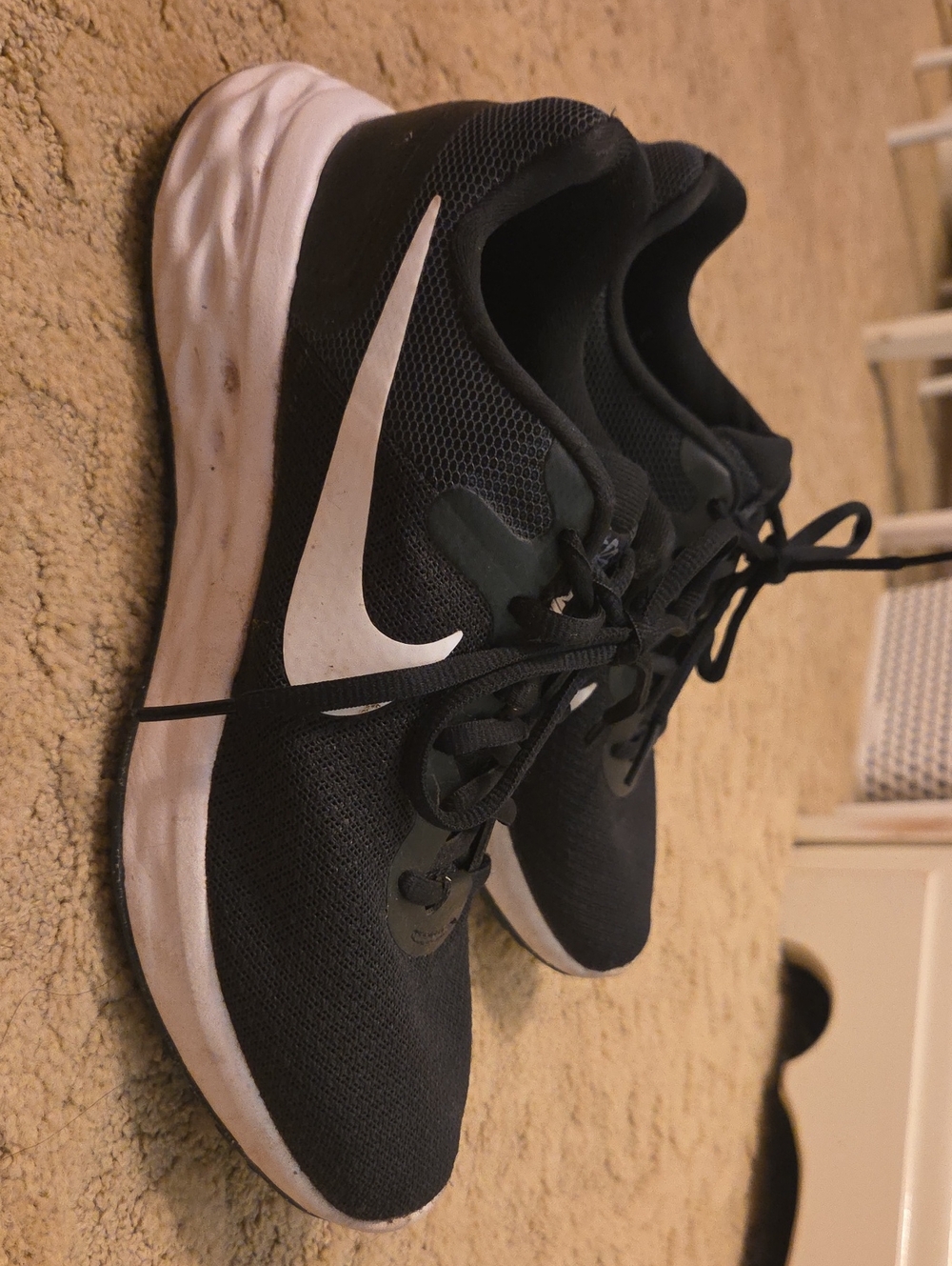 Nike Black Athletic Running Shoes with White Swoosh